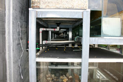 Detail of the plumbing in the Spotted Tree Frog container. Copyright Amphibian Research Centre. Photograph by Gerry Marantelli.