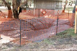 After the initial earthwork, the site is fenced off, awaiting frog watchers who will finish the job. Copyright Amphibian Research Centre.