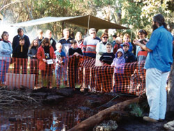 Gerry Marantelli discusses the finishing touches to be added to the pond by the team of volunteers. Copyright Amphibian Research Centre.