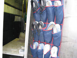 Strict quarantine applies in the cricket room - even your shoes must be changed. Copyright Amphibian Research Centre. Photograph by Dave Black.